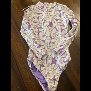 O’Neill girls long sleeve swim zip-up. No tags, but fits 10-12. Smoke-free home.